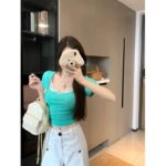 148036Korean green fake two piece short sleeved T-shirt for women's summer design, niche lace lace lace short style sweet and spicy girl top