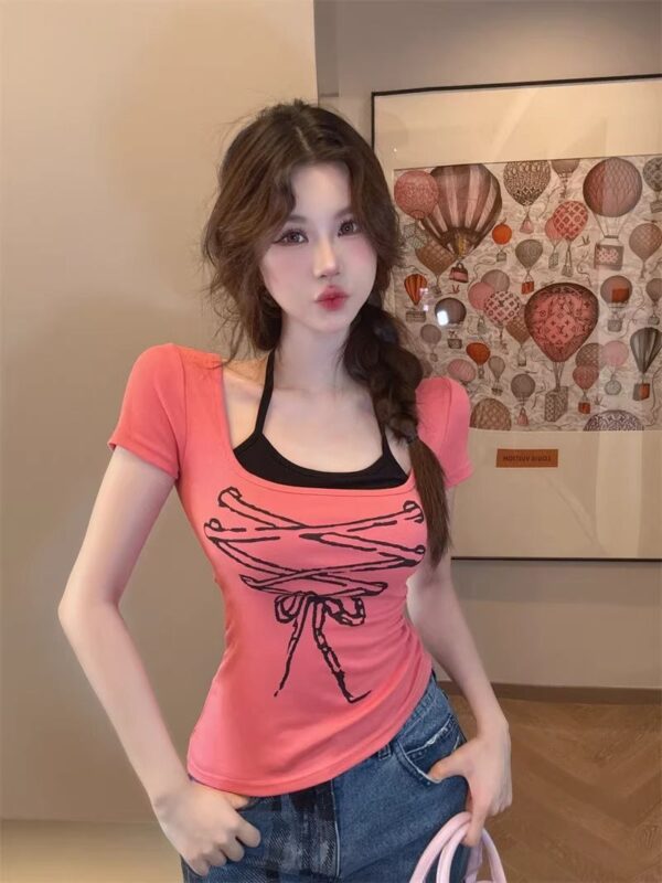 148037Retro spicy girl fun strap printed short sleeved T-shirt for women with irregular chest cushion, fake two pieces hanging on the neck